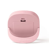 Pink electronic device on a white background