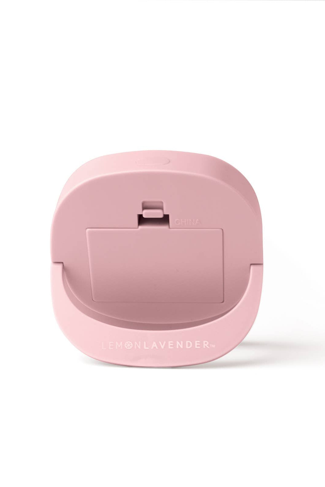 Pink electronic device on a white background