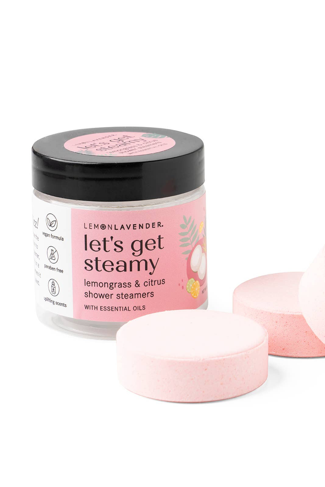 Jar of 'let's get steamy' shower steamers with pink packaging on a white background