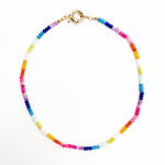 Multicolored beaded bracelet on a white background