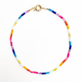 Multicolored beaded bracelet on a white background