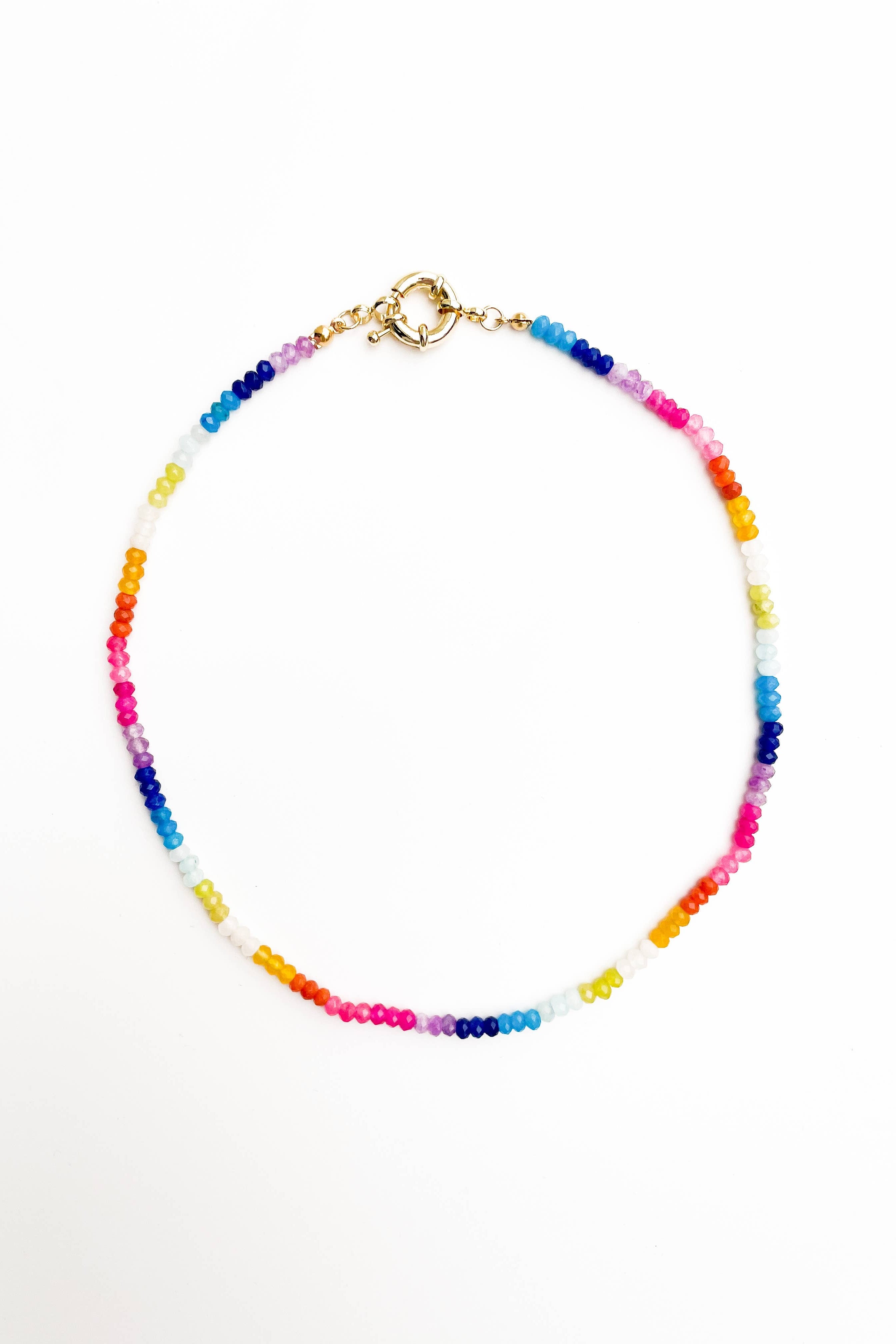 Multicolored beaded bracelet on a white background