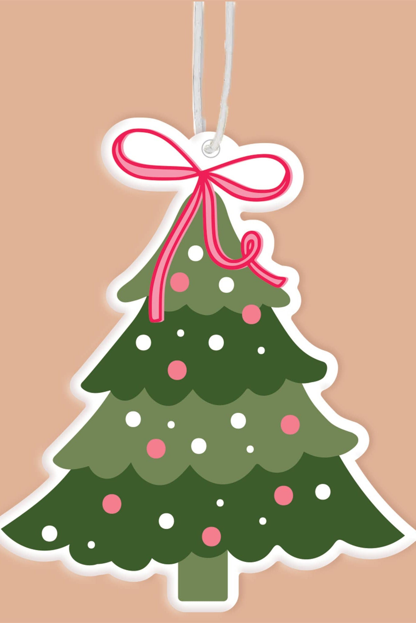 Decorative Christmas tree ornament with a pink bow on a beige background