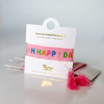 Packaged product with colorful text on a white surface